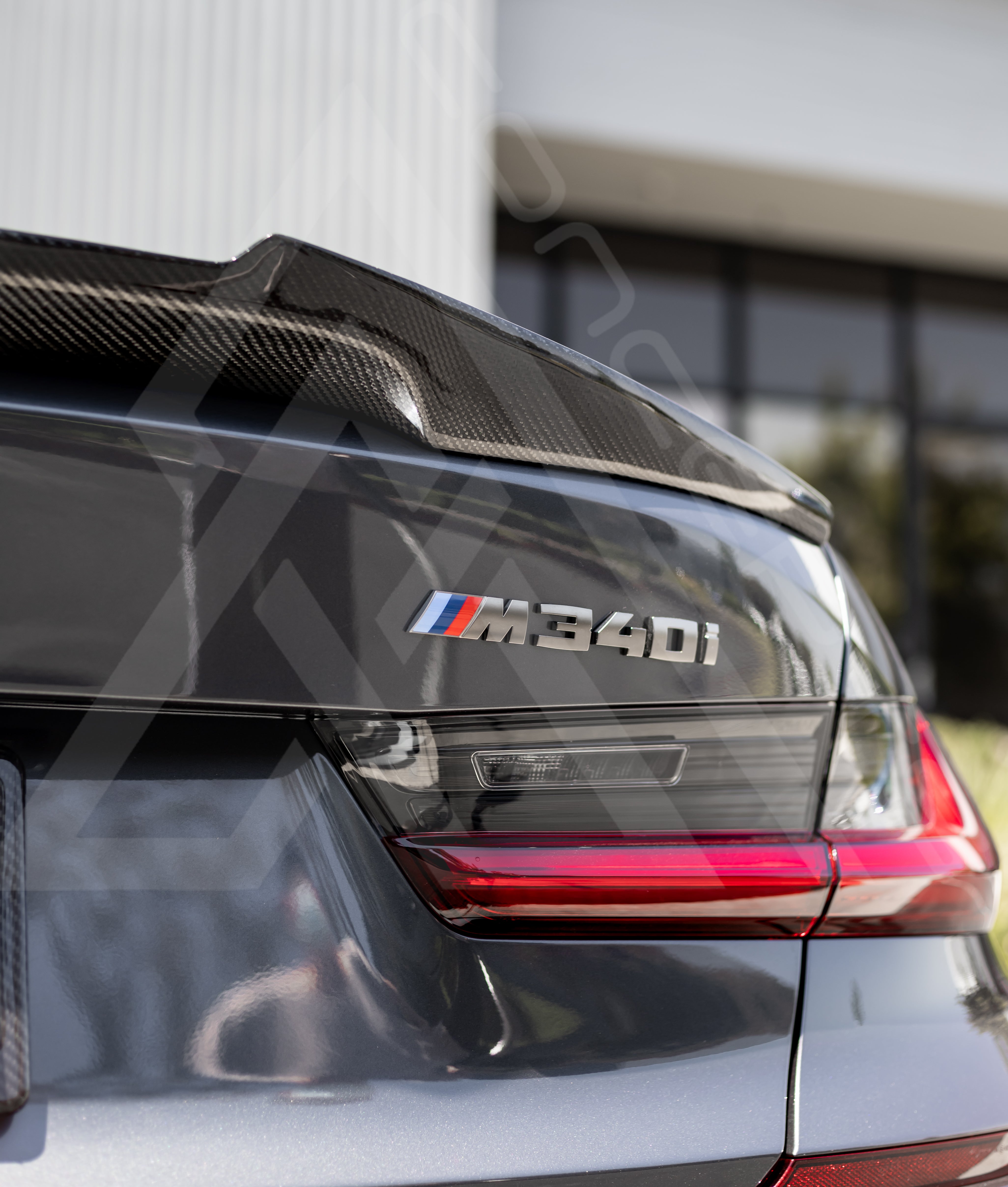 M4-Style Carbon Fiber Trunk Lip – BMW G20 / G80 | Eterna Motorworks
